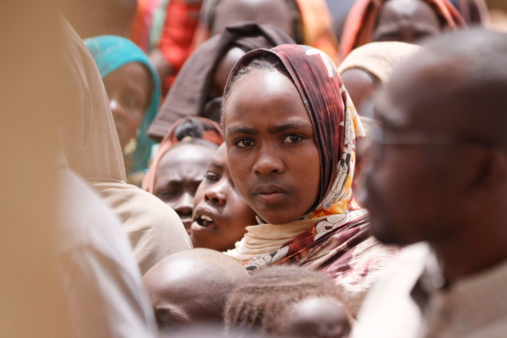Families reach a camp for the displaced in Tawila, North Darfur. Families reach a camp for the displaced in Tawila, North Darfur.