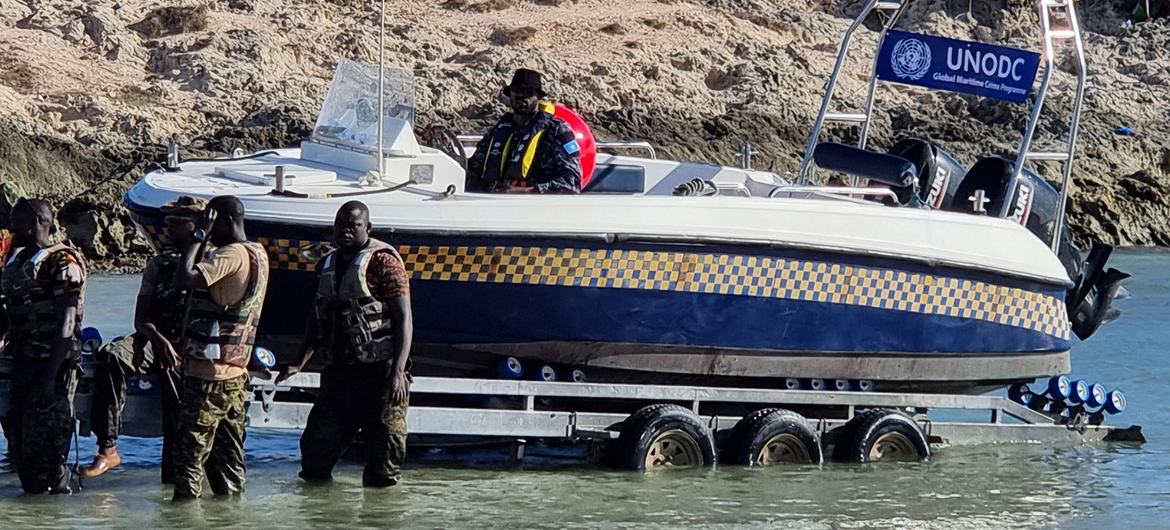 A coast guard patrol boat is launched near Mogadishu in Somalia.