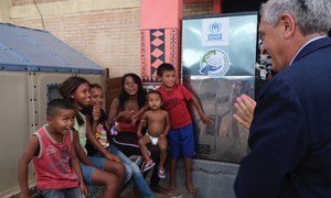 The head of the United Nations refugee agency, Filippo Grandi, meets Venezuelan refugee children during his visit to Brazil.