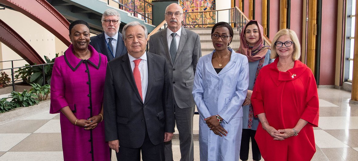 Secretary-General António Guterres stands with three victims of terrorism who spoke at the launch of "Surviving Terrorism: The Power of Resilience” photo exhibition. (August 2019)
