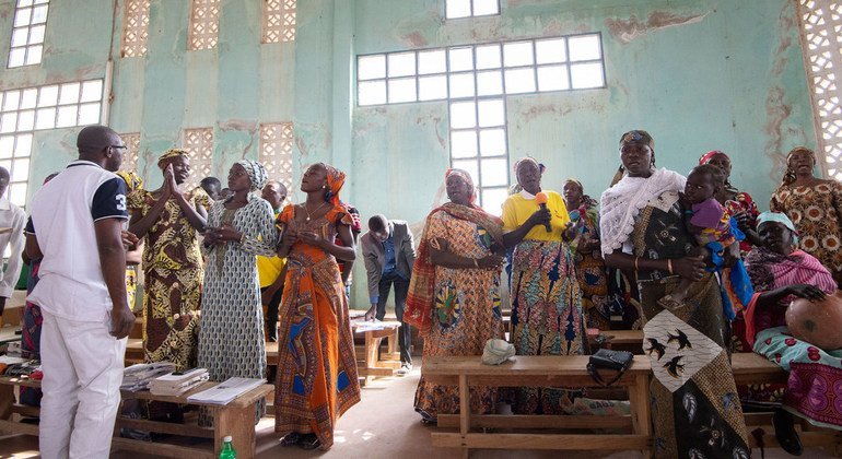 Cameroonians, including Wala Matari (far right,) displaced by terrorist activity in the Lake Chad region attend church in north-east Cameroon.