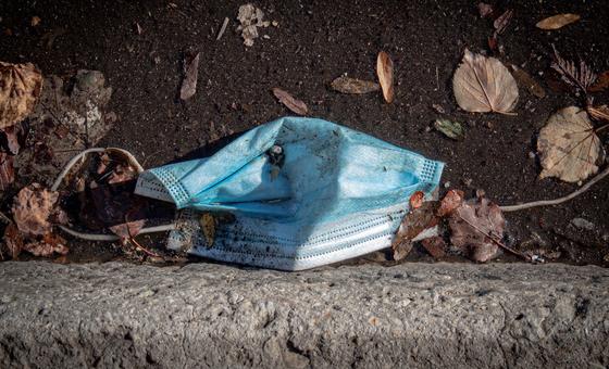 A disposable face mask discarded on the street in Chicago, USA.