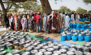 Food and other items are distributed in Chad to people who have fled violence in Sudan.