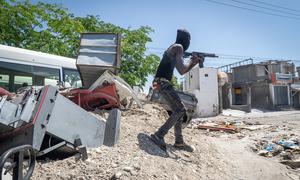 A gang member operates in a neighbourhood of Port-au-Prince.