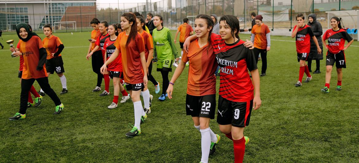 In Turkey, young women play in a soccer match to end violence against women and girls.