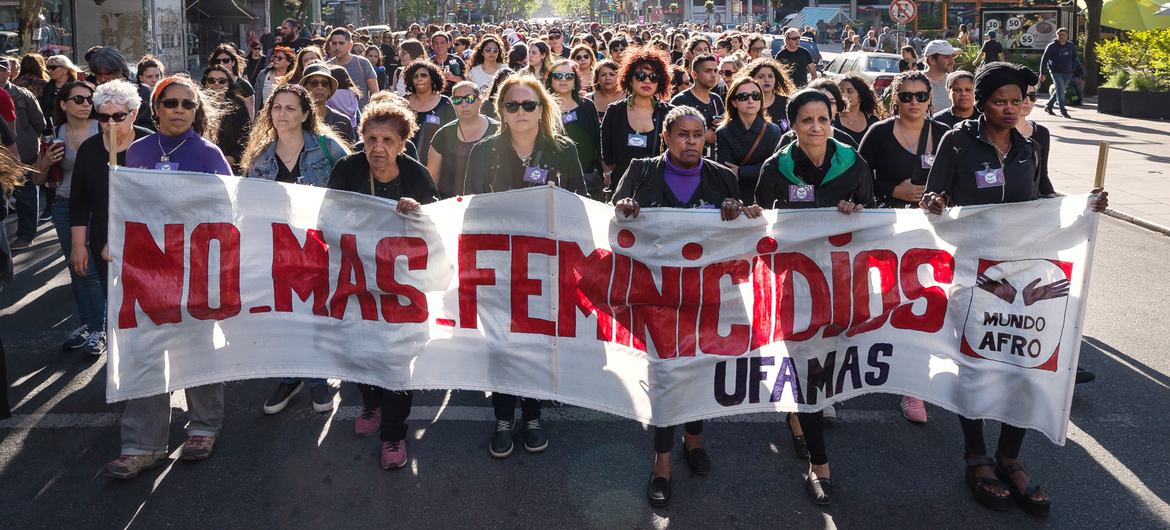 Women march in Uruguay to end violence against women.