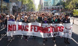 Women march in Uruguay to end violence against women.