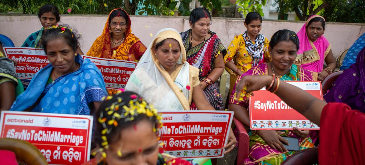 Community activists in Odisha state, India, highlight the dangers of child marriage.