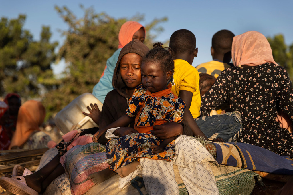 Refugees from Sudan arrive in Adre on the border with Chad. Refugees from Sudan arrive in Adre on the border with Chad.