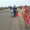 Families flee Sinja, southern Sudan, following violent clashes.