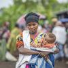 Francine et ses trois enfants ont été contraints de quitter leur village en raison du conflit incessant qui sévit dans l'est de la RDC. Ils reçoivent aujourd'hui l'aide du PAM dans un camp pour personnes déplacées au Nord-Kivu.