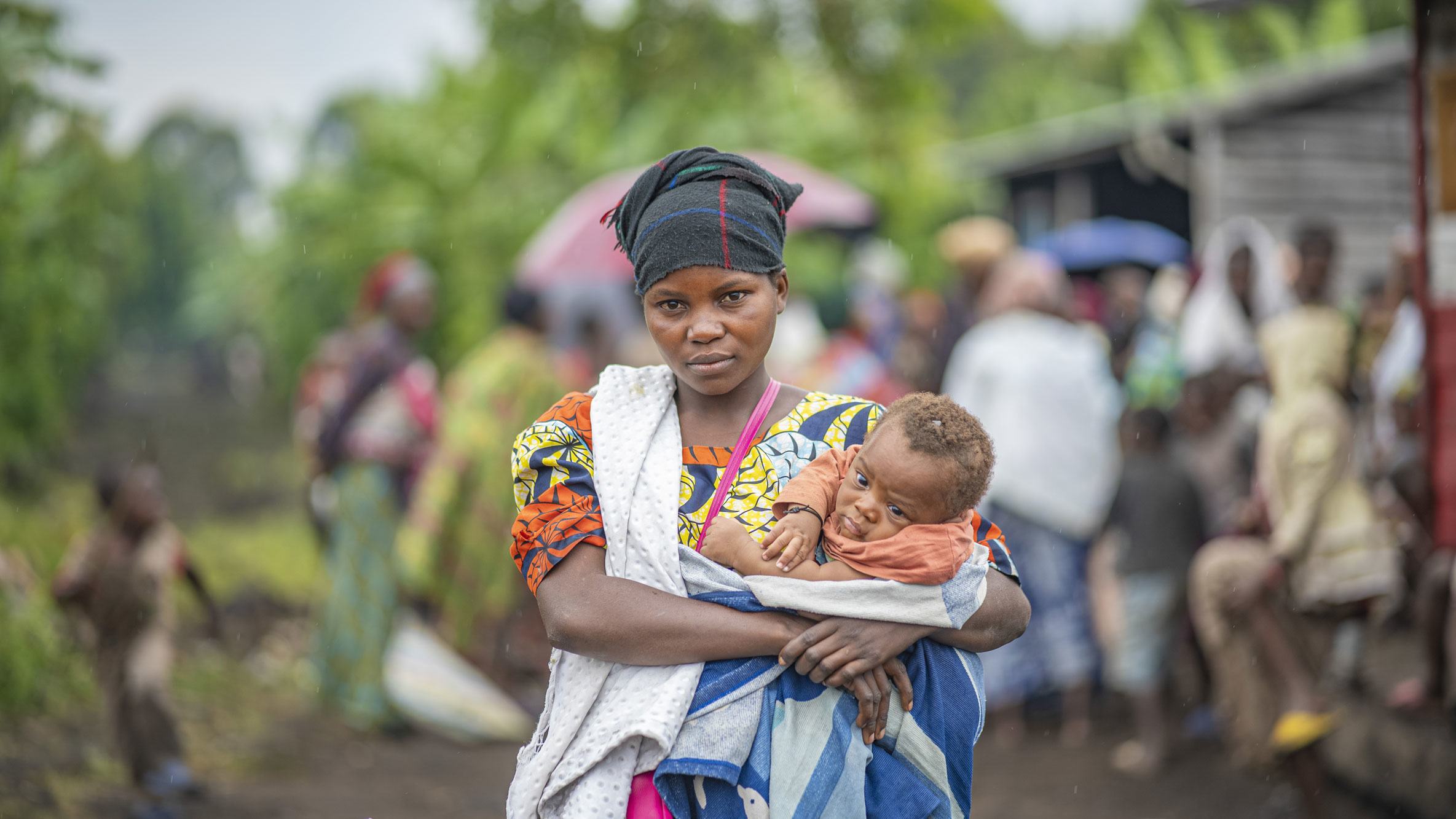 Francine et ses trois enfants ont été contraints de quitter leur village en raison du conflit incessant qui sévit dans l'est de la RDC. Ils reçoivent aujourd'hui l'aide du PAM dans un camp pour personnes déplacées au Nord-Kivu.