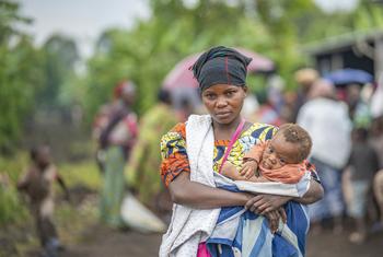 Francine et ses trois enfants ont été contraints de quitter leur village en raison du conflit incessant qui sévit dans l'est de la RDC. Ils reçoivent aujourd'hui l'aide du PAM dans un camp pour personnes déplacées au Nord-Kivu.