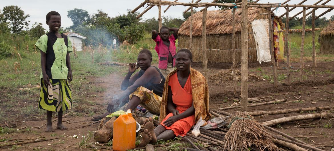 A family finds refuge at a former UNMISS base in southwestern South Sudan.