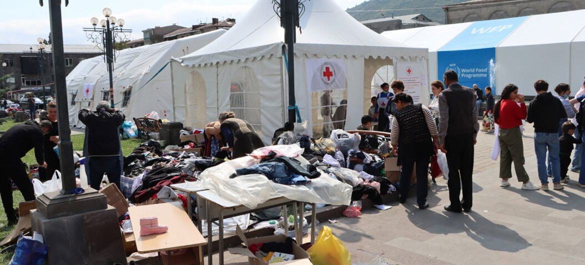 People fleeing Karabakh rest and receive humanitarian aid in Goris, Armenia.