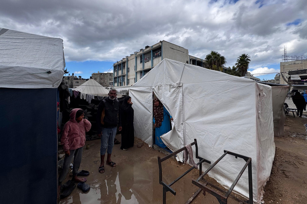 In Gaza, over 1.9 million displaced people live in overcrowded shelters and tents, struggling to survive daily.