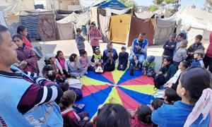 Children in Gaza receive support from UNRWA staff members. In his priorities speech the UN chief paid tribute to the agency as the backbone of the humanitarian response in Gaza.