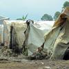A man carries water in a camp for displaced people in Goma, in the eastern Democratic Republic of the Congo.