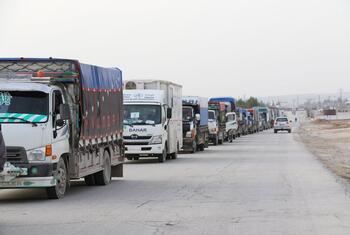 Trucks carrying humanitarian aid arrive in Ain Al Arab, Syria, in February 2026.
