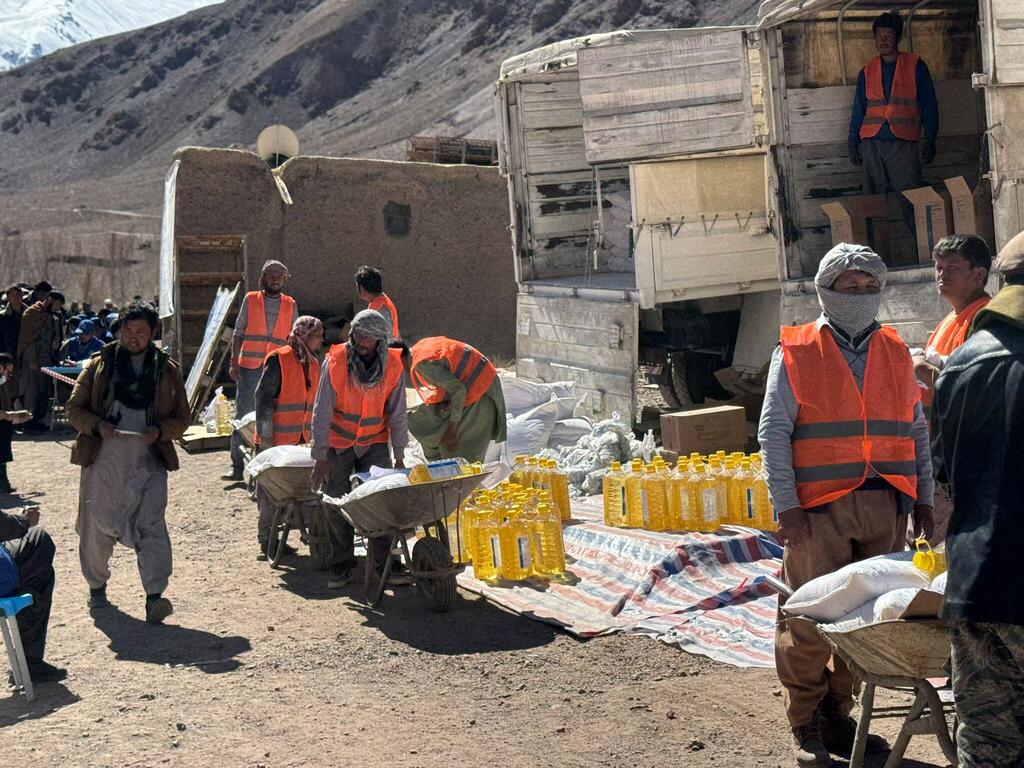 Food aid is distributed by the UN in Parwan province, Afghanistan.
