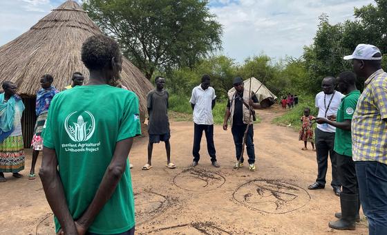 Farmers in South Sudan discuss how to improve the quality of seeds.