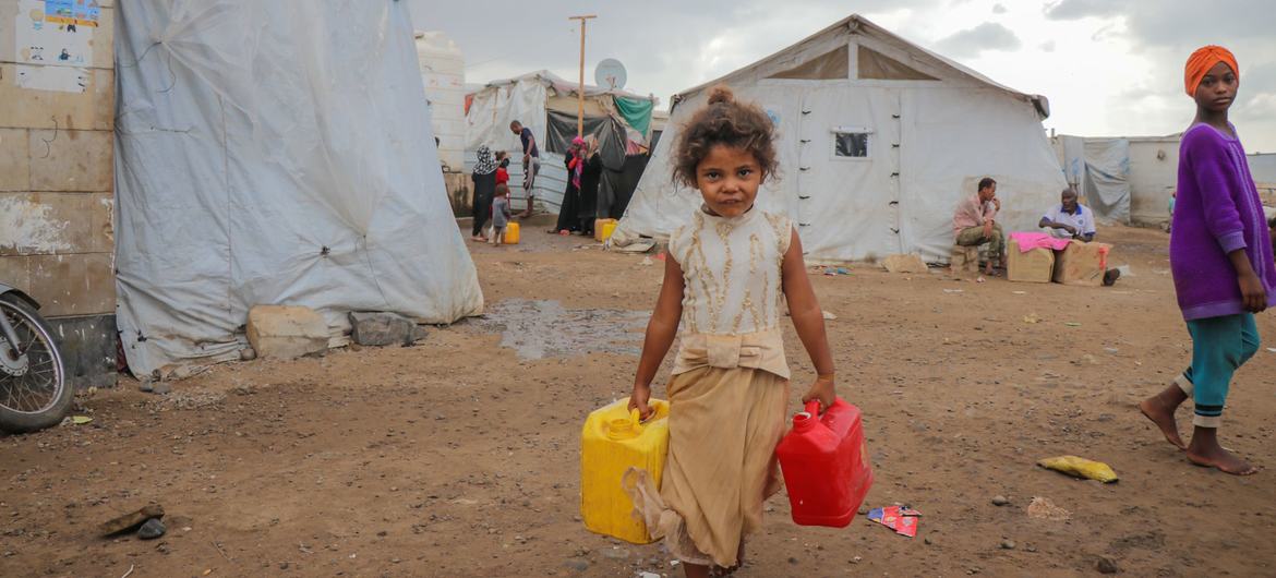 A child fetches clean water at a camp for displaced people in Dar Saad in Yemen. (file)