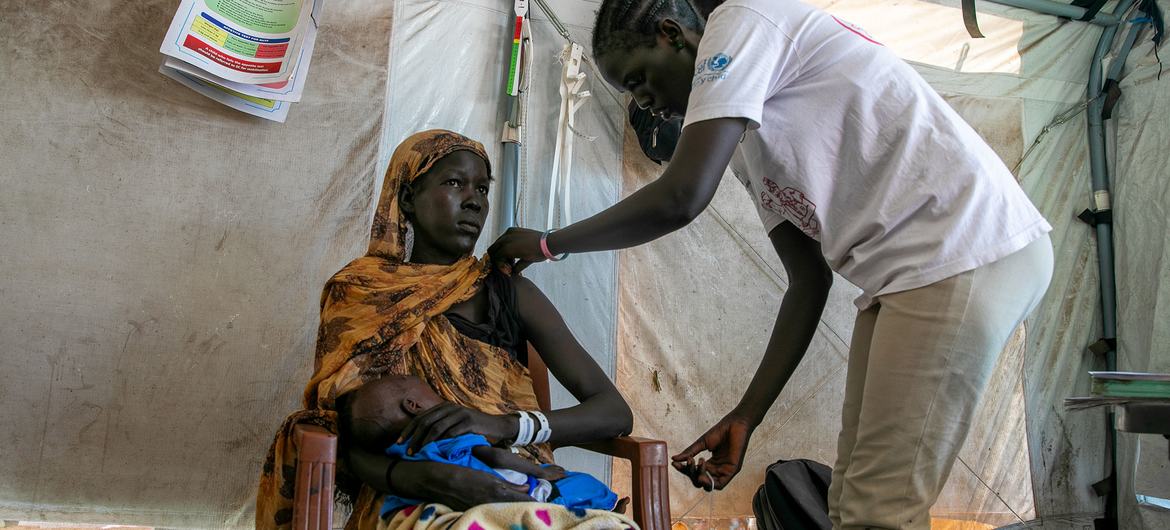 A woman is being checked for malnutrition in South Sudan.  (document)