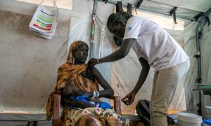 A woman is being screened for malnutrition in South Sudan. "Health is the last safety net. If it fails, everything else will also fall.", said Dr Humphrey Karamagi, the UN World Health Organization (WHO)'s Representative in South Sudan. 