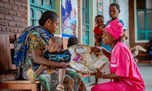 A mother at a clinic in Goma in the eastern DR Congo receives family planning information.