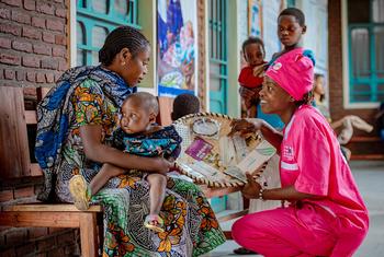 A mother at a clinic in Goma in the eastern DR Congo receives family planning information.