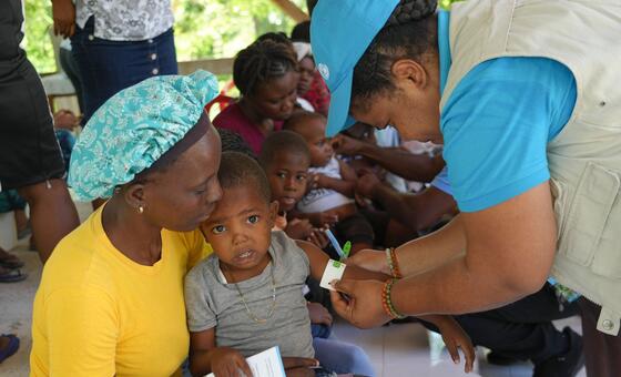 A child receives treatment at a UNICEF mobile clinic for displaced families in Boucan Carré, Haiti.