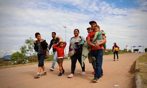 A family arrives in Brazil after crossing the Venezuelan border by foot. (file)