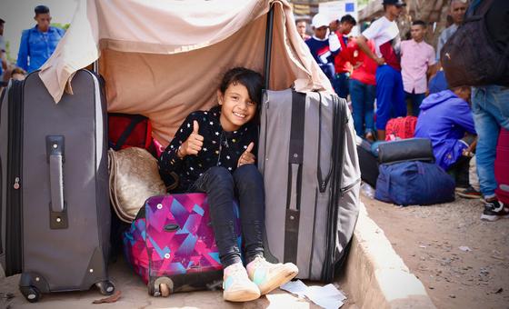 A Venezuelan girl waits at a reception center in Pacaraima, a city in northern Brazil across the Venezuelan border.