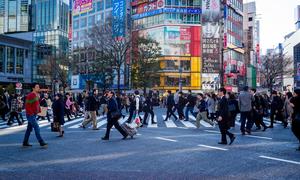 A busy street scene in the city of Tokyo, Japan.