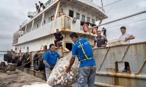 Plastic garbage is offloaded from a fishing boat on the east coast of China.