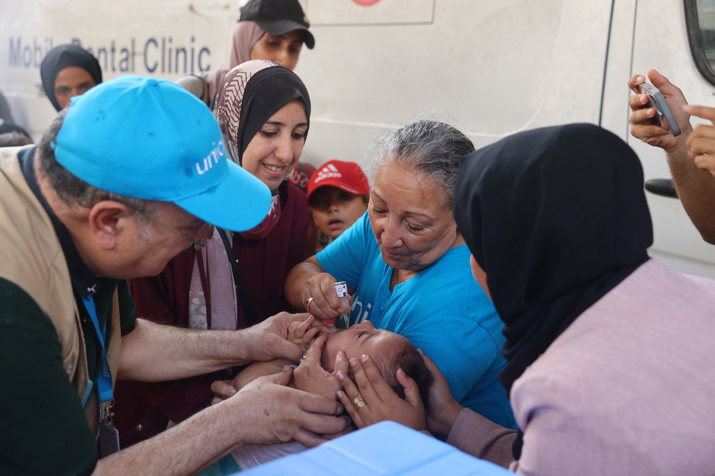 UN staff administer polio vaccines at a health clinic in Deir al-Balah, Gaza, in September 2024.