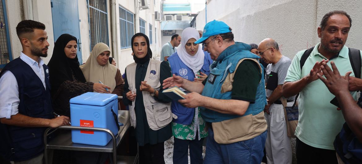 UNICEF staff prepare to administer polio vaccines at a health clinic in Deir al-Balah in central Gaza.