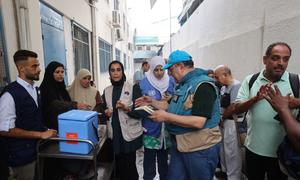 UNICEF staff prepare to administer polio vaccines at a health clinic in Deir al-Balah in central Gaza.