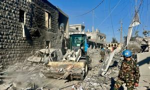 Peacekeepers serving with the UN Interim Force in Lebanon (UNIFIL) clear debris from a recent bombing between Meiss el Jabal and Tebnin.