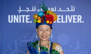 A woman from an indigenous community attends COP28 at  Expo City Dubai.