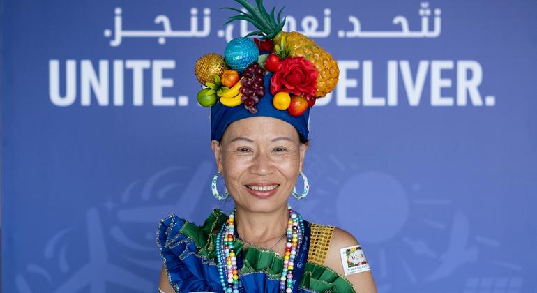 A woman from an indigenous community attends COP28 at  Expo City Dubai.