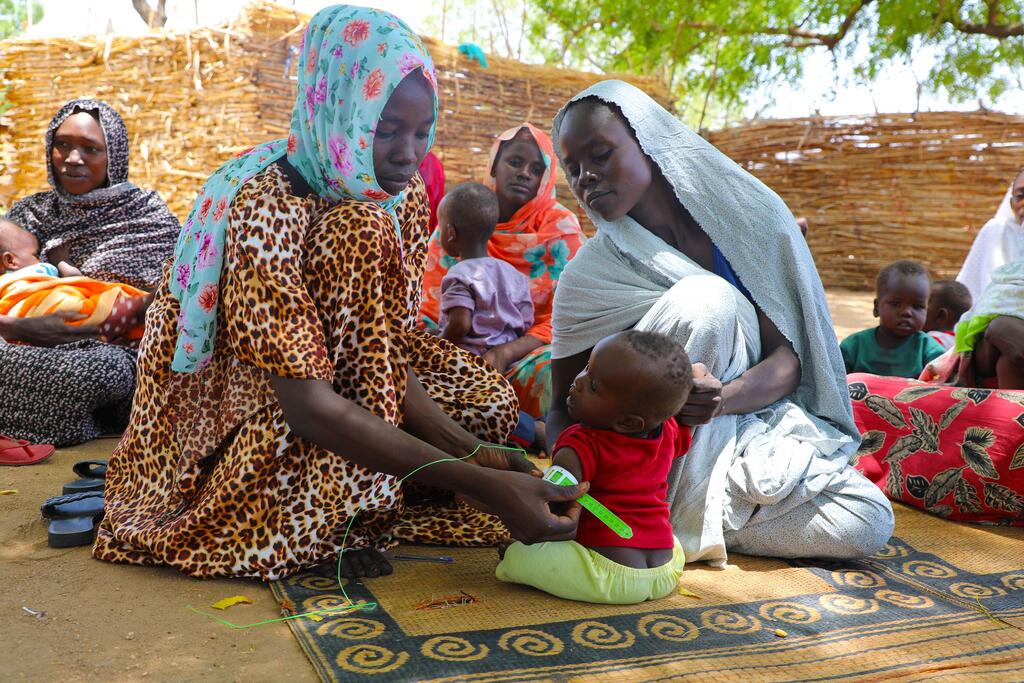 Women in Golonti, Chad, participate in a nutrition sensitization session led by local community members.