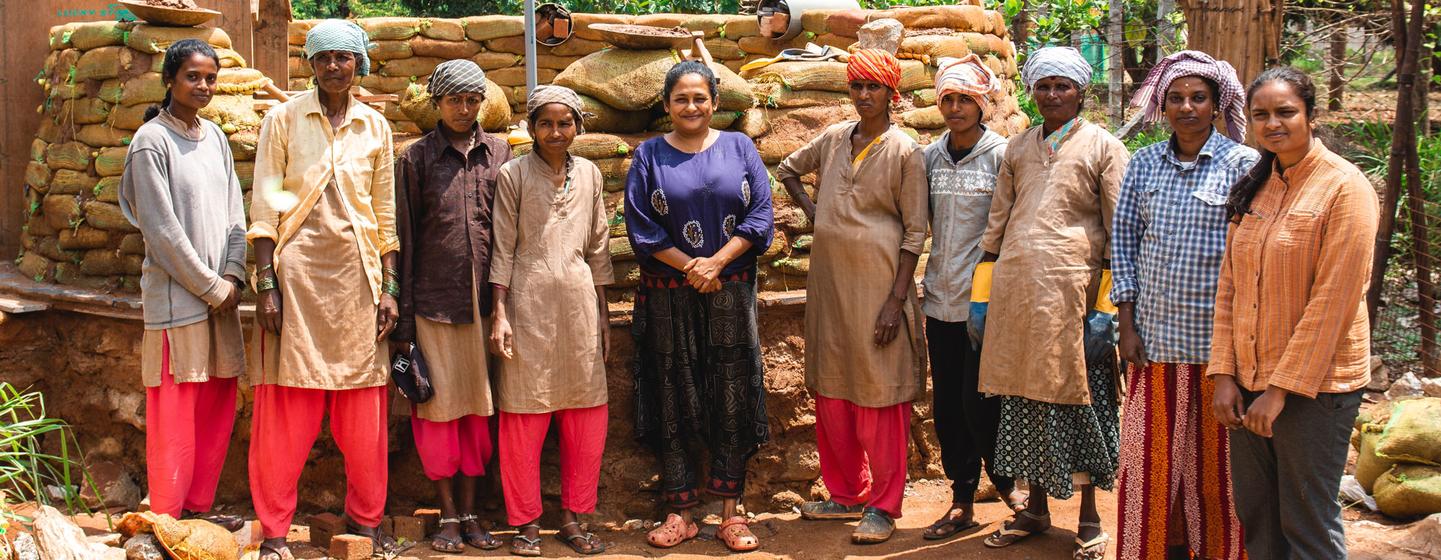 Sindhoor Pangal (center) worked with Masons Ink and a team of women masons to create her mud home.