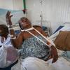 A victim of gang violence in Haiti is treated in hospital.