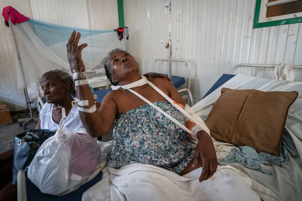 A victim of gang violence in Haiti is treated in hospital.