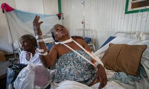 A victim of gang violence in Haiti is treated in hospital.