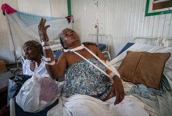 A victim of gang violence in Haiti is treated in hospital.