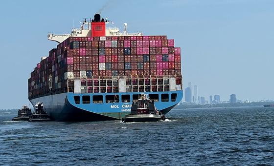 A container ship arrives in New York harbour in the United States.
