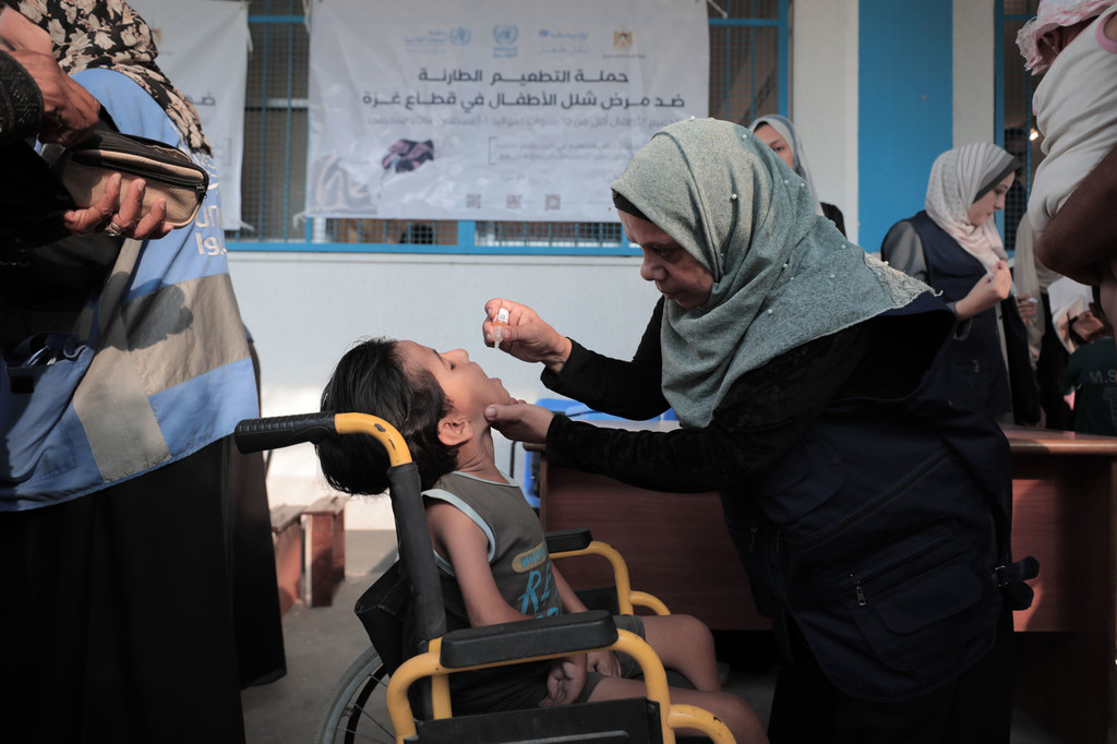 A child receives a polio vaccine in Gaza.