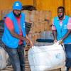 UNHCR staff prepare relief items to be distributed to refugee families in Dadaab camp.